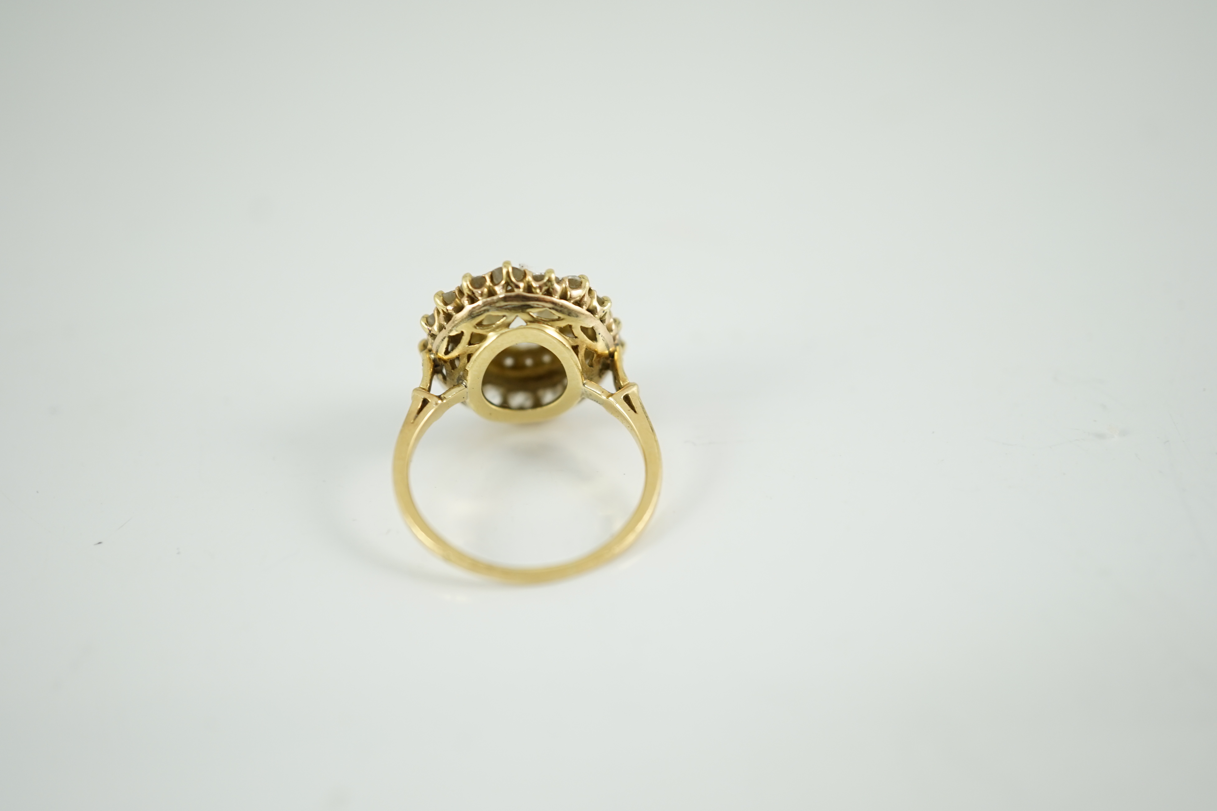 An early to mid 20th century French Van Cleef & Arpels 18ct gold and diamond set oval cluster dress ring